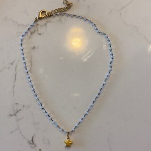 Beaded necklace with star charm